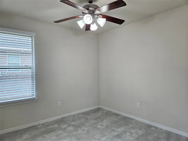 en empty room with a window