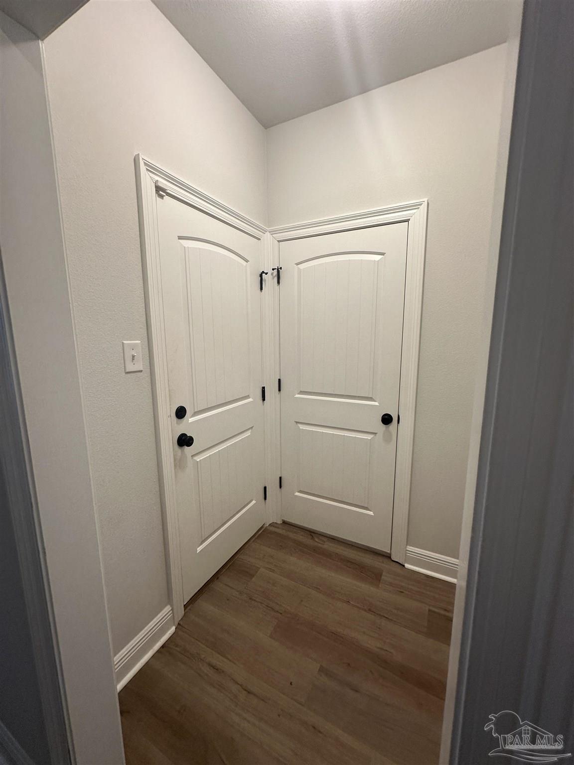 4753 Sago Palm Circle Pace, FL 32571 - Photo 20 of 24 wooden view of empty room