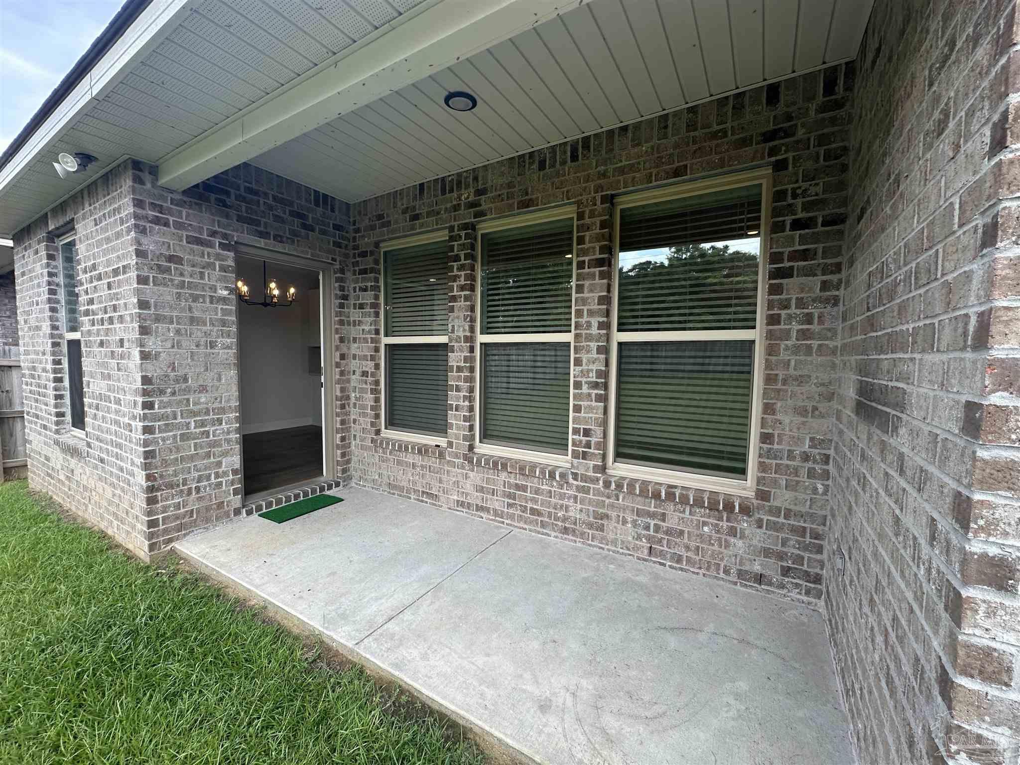 4753 Sago Palm Circle Pace, FL 32571 - Photo 23 of 24 a view of entrance front of the house