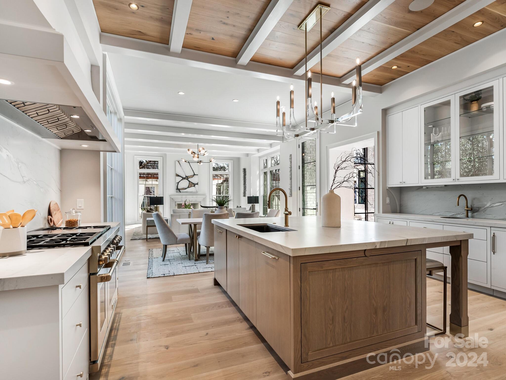 2215 Ferncliff Road Charlotte, NC 28211 - Photo 13 of 46 a kitchen with stainless steel appliances granite countertop a lot of counter space
