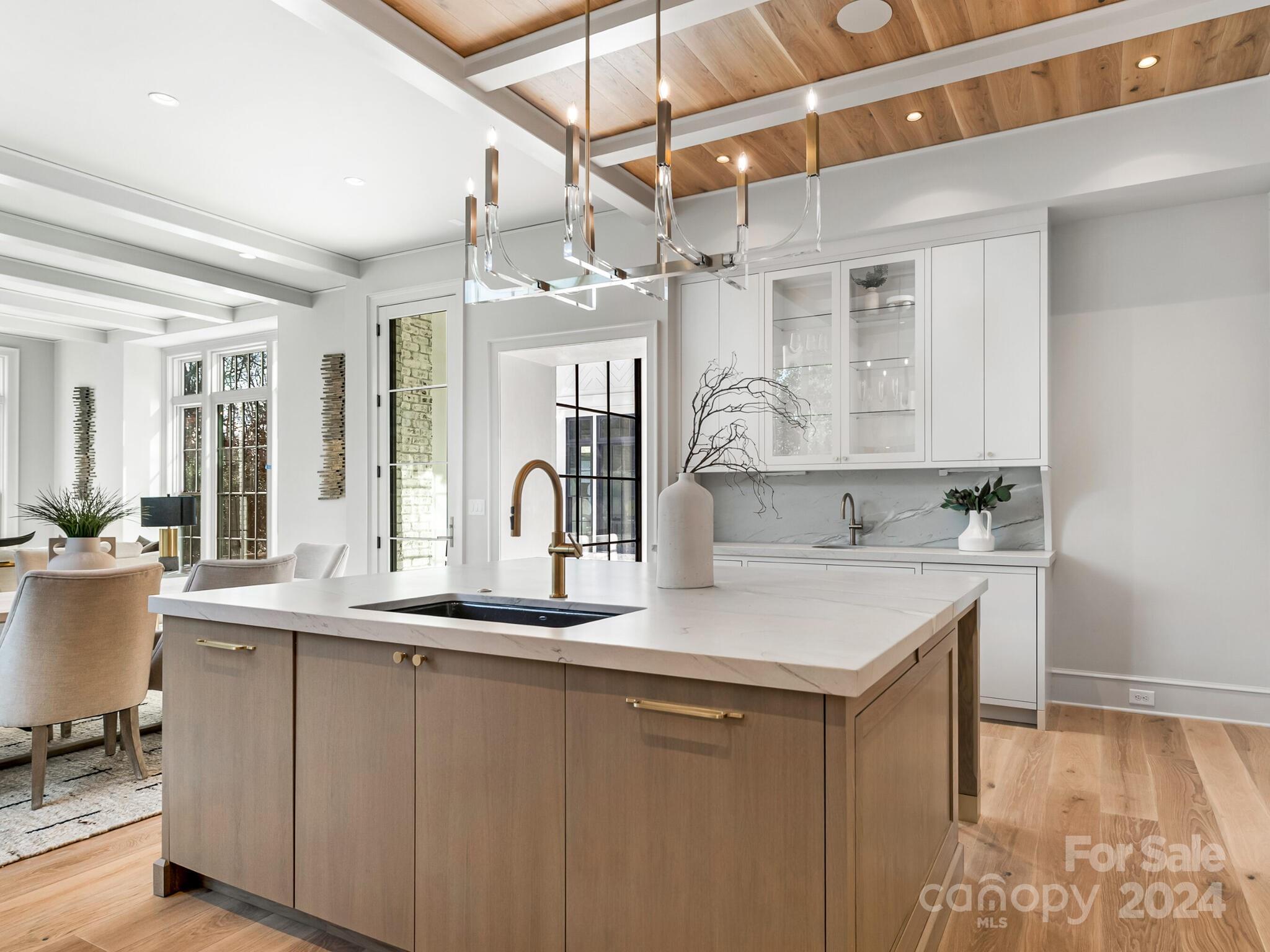 2215 Ferncliff Road Charlotte, NC 28211 - Photo 14 of 46 a kitchen with a sink and cabinets