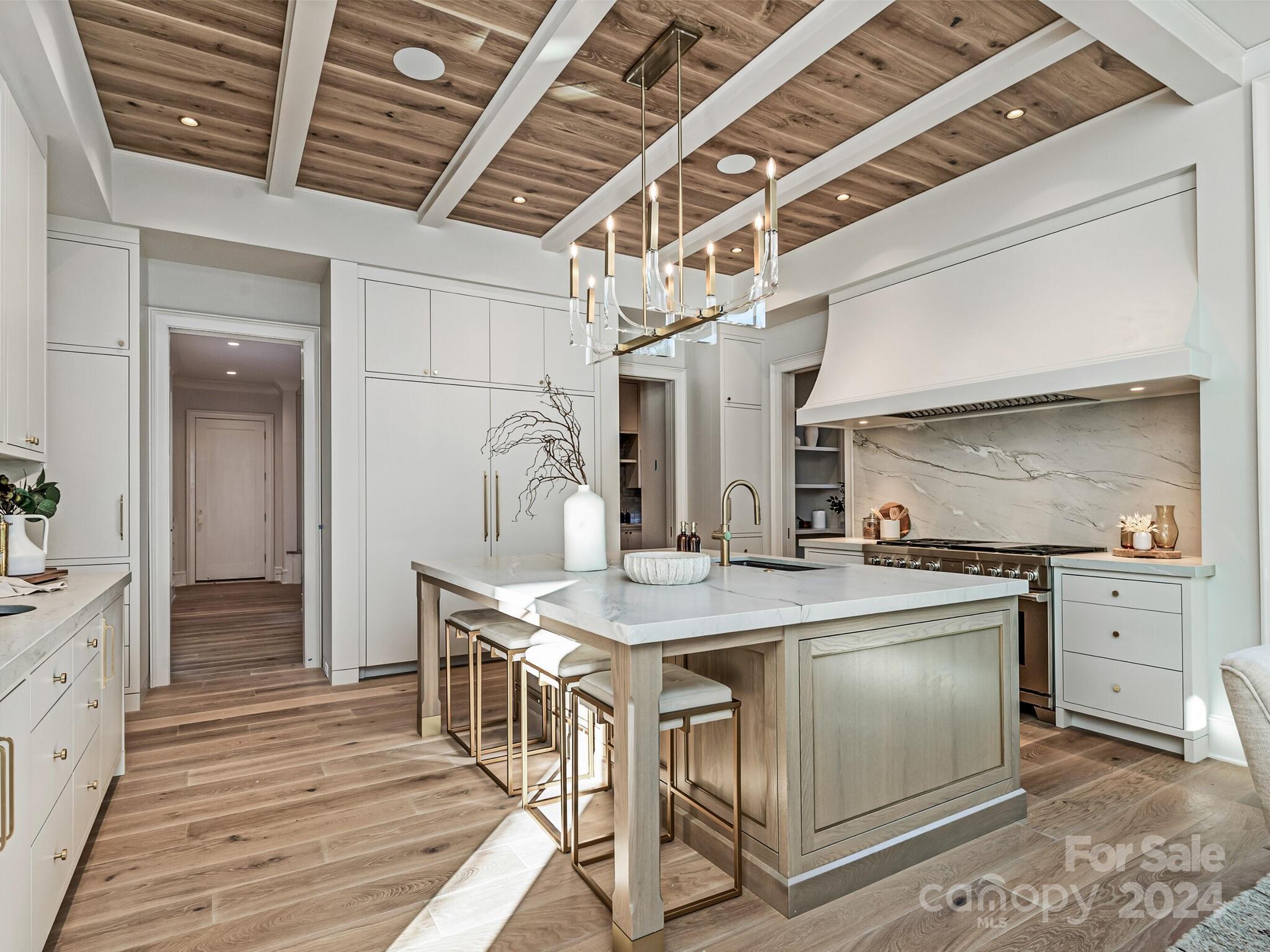 2215 Ferncliff Road Charlotte, NC 28211 - Photo 15 of 46 a kitchen with stainless steel appliances granite countertop a sink stove and refrigerator