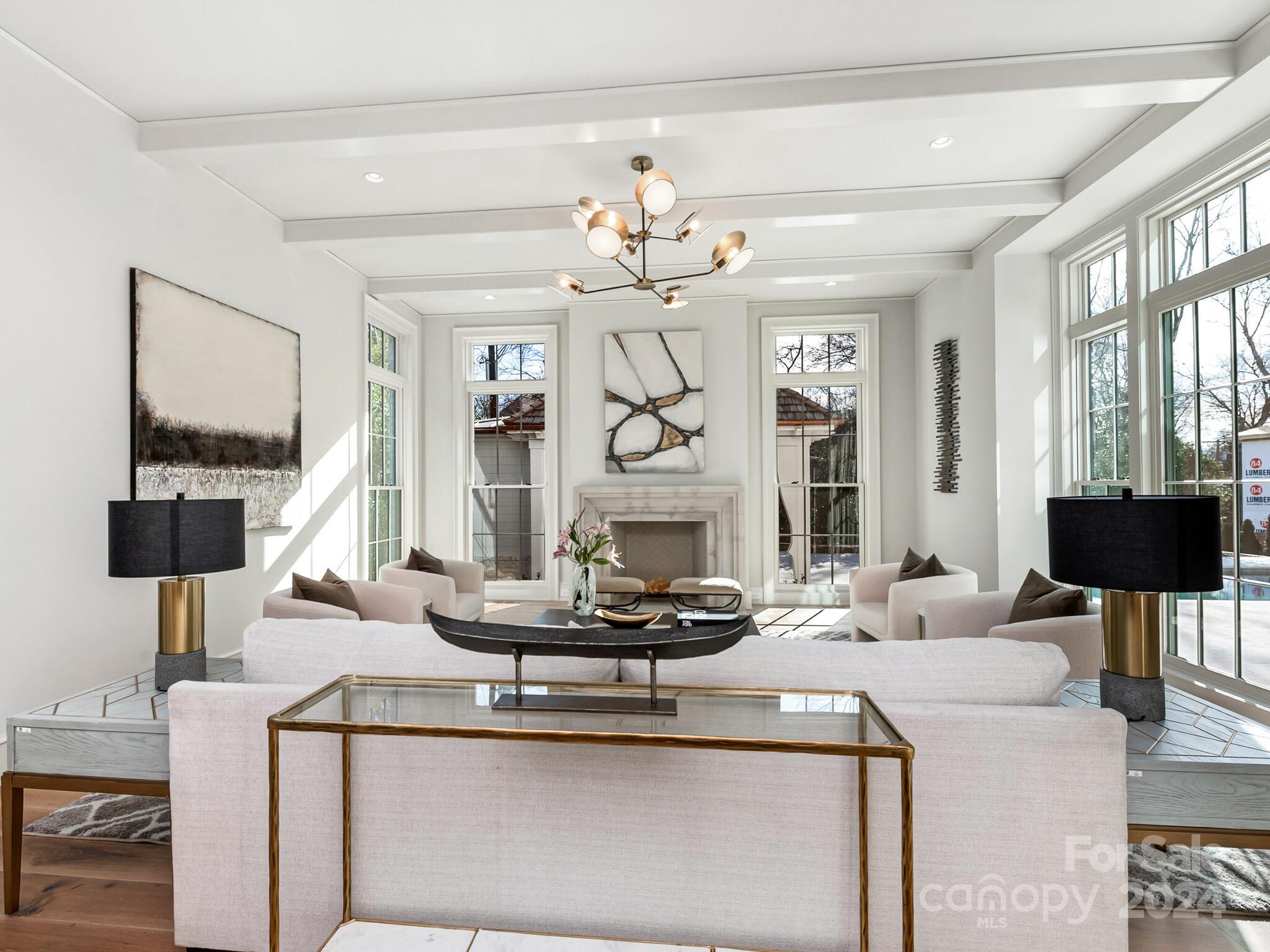 2215 Ferncliff Road Charlotte, NC 28211 - Photo 18 of 46 a living room with fireplace furniture and a flat screen tv