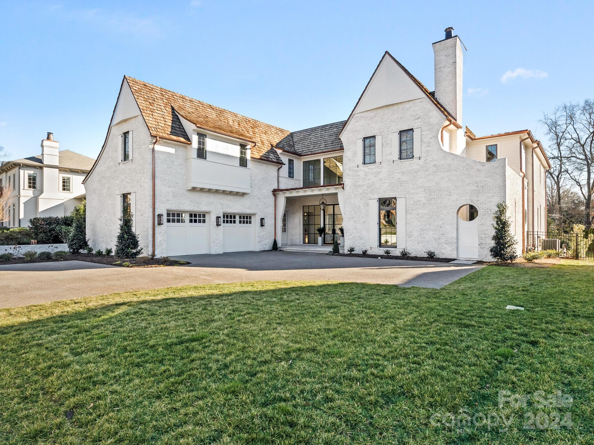 2215 Ferncliff Road Charlotte, NC 28211 - Photo 2 of 46 a view of a house with backyard and a tree