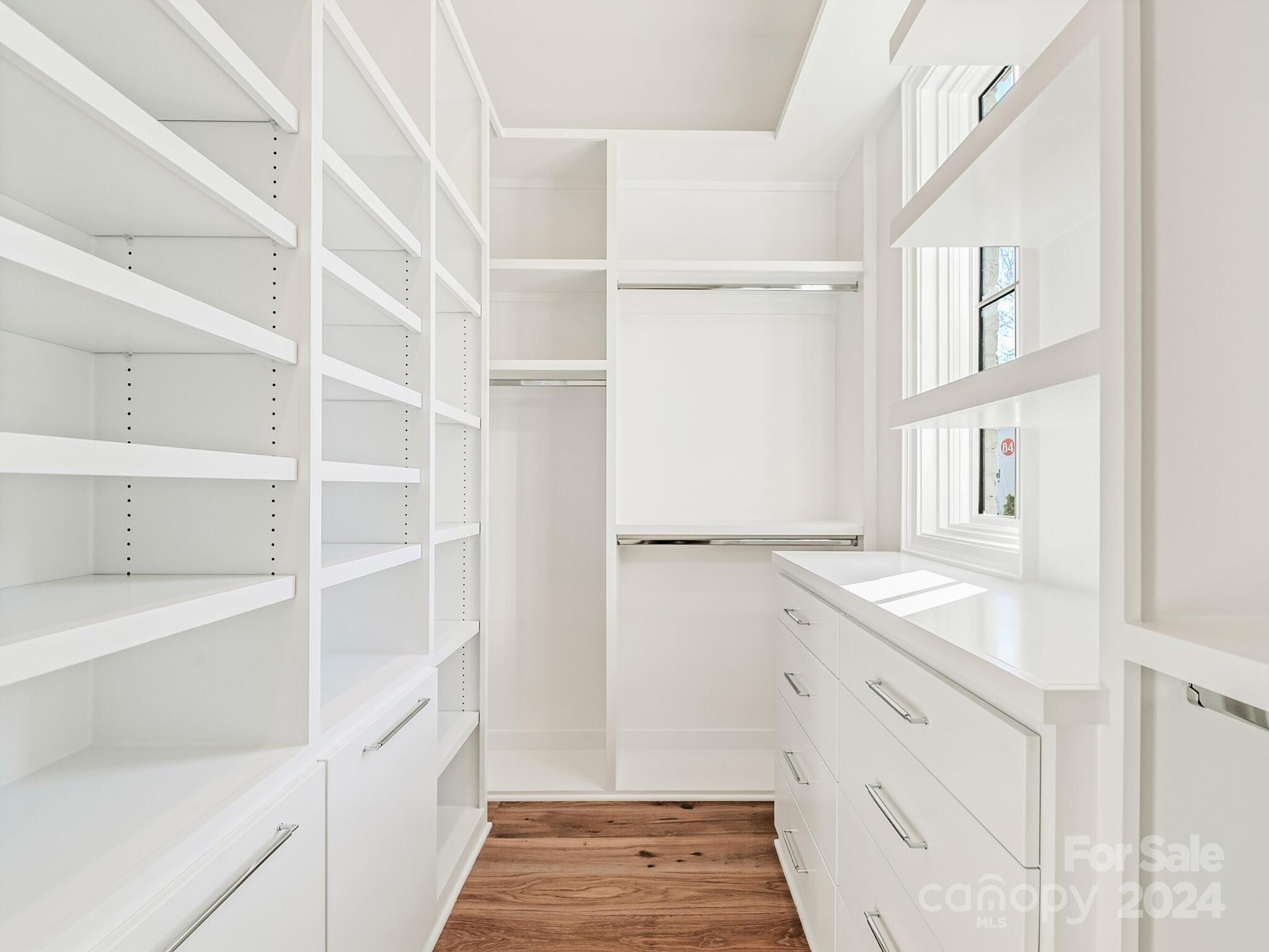 2215 Ferncliff Road Charlotte, NC 28211 - Photo 27 of 46 a view of walk in closet and bedroom view