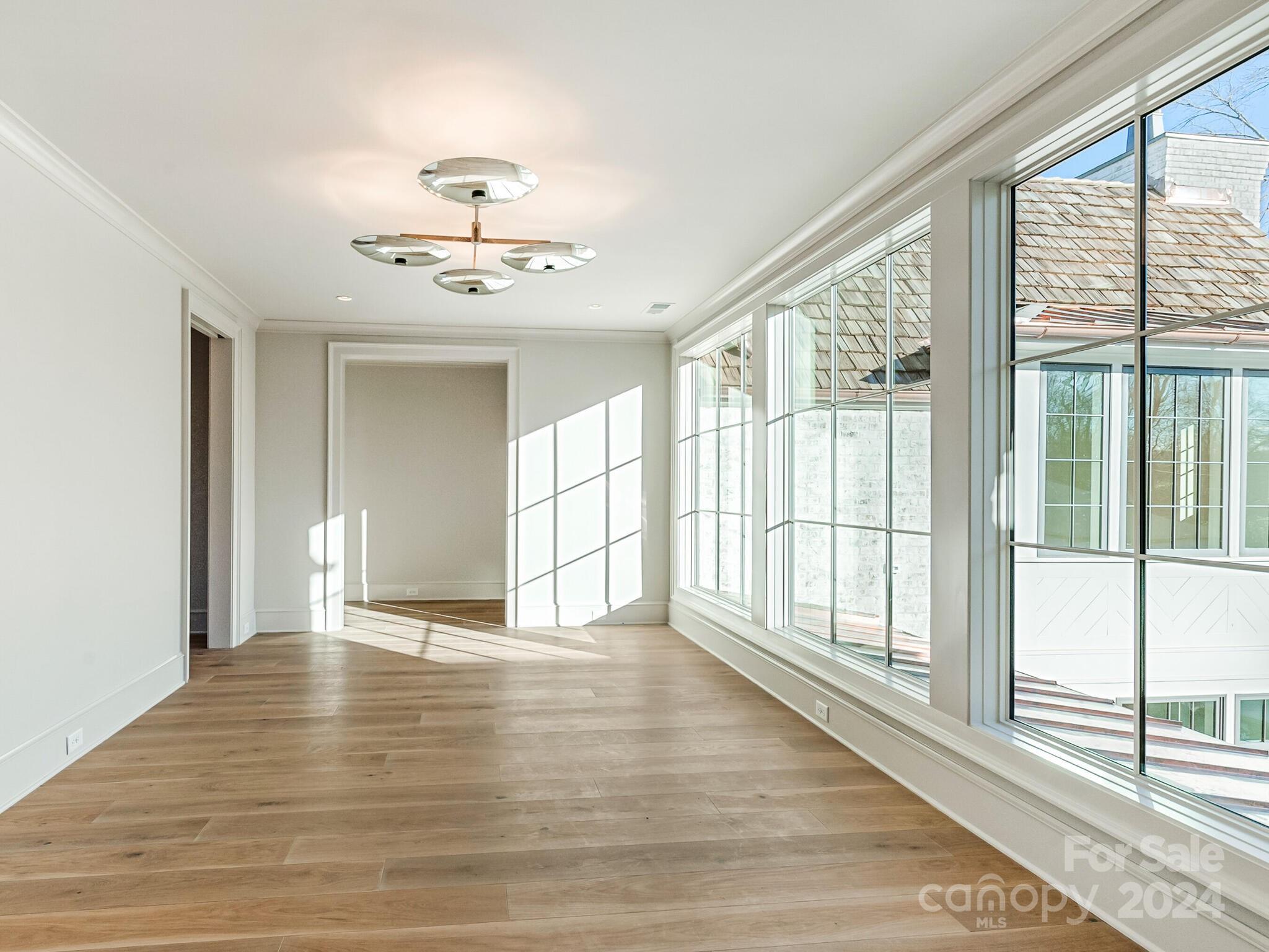 2215 Ferncliff Road Charlotte, NC 28211 - Photo 28 of 46 a view of an empty room with a window