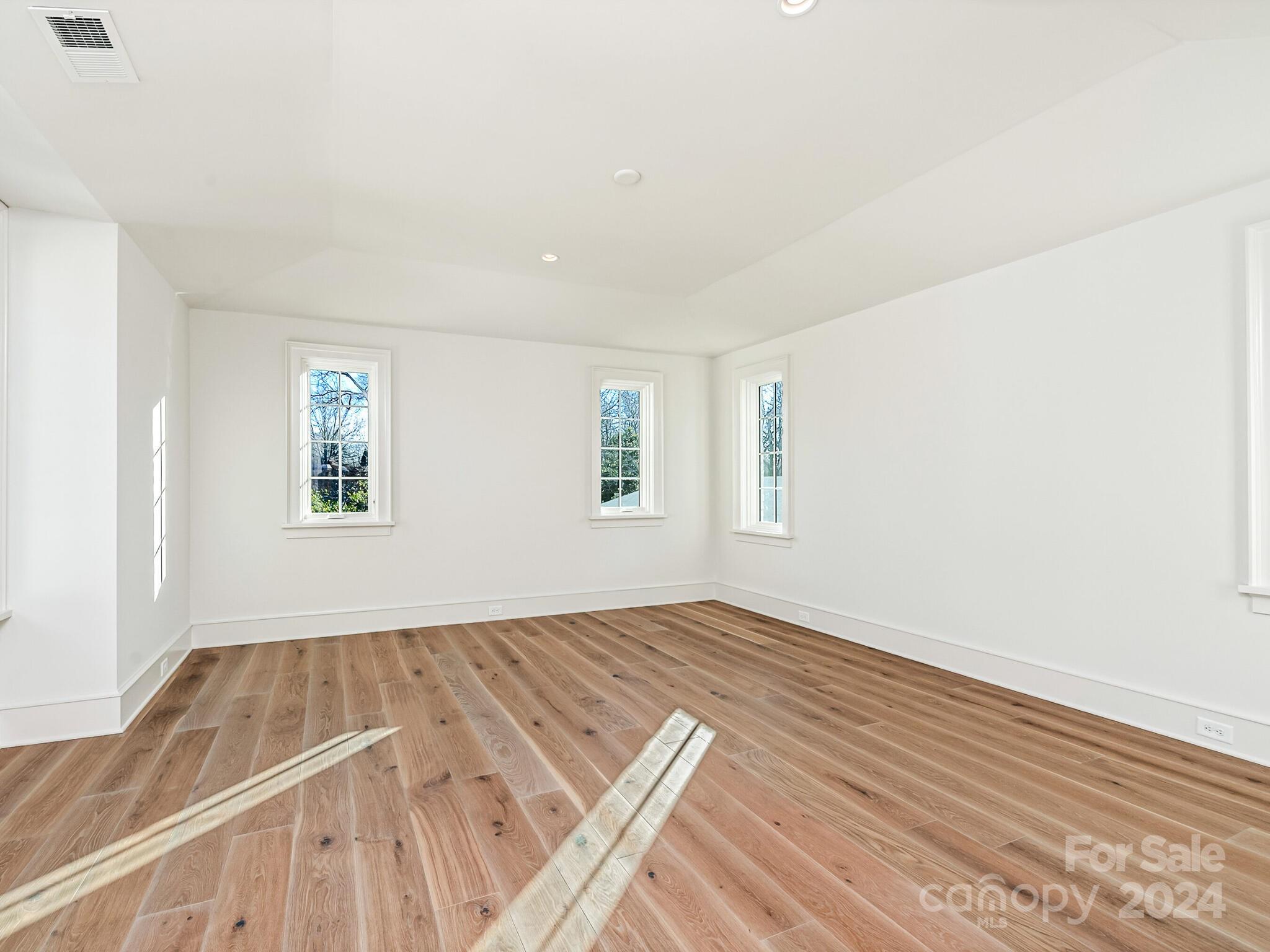2215 Ferncliff Road Charlotte, NC 28211 - Photo 35 of 46 a view of a room with wooden floor and window