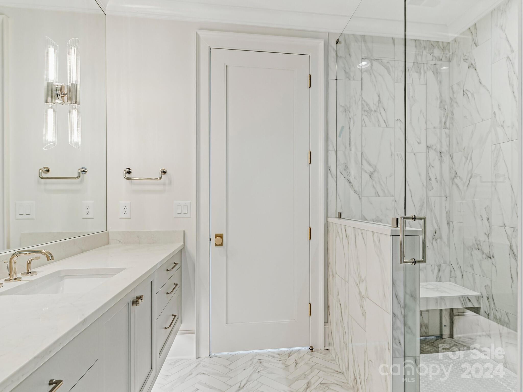 2215 Ferncliff Road Charlotte, NC 28211 - Photo 37 of 46 a bathroom with a sink and a mirror