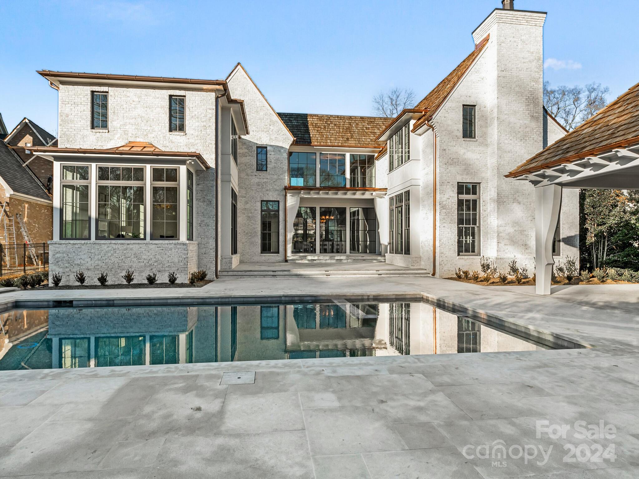 2215 Ferncliff Road Charlotte, NC 28211 - Photo 42 of 46 a front view of a building with a lots of windows