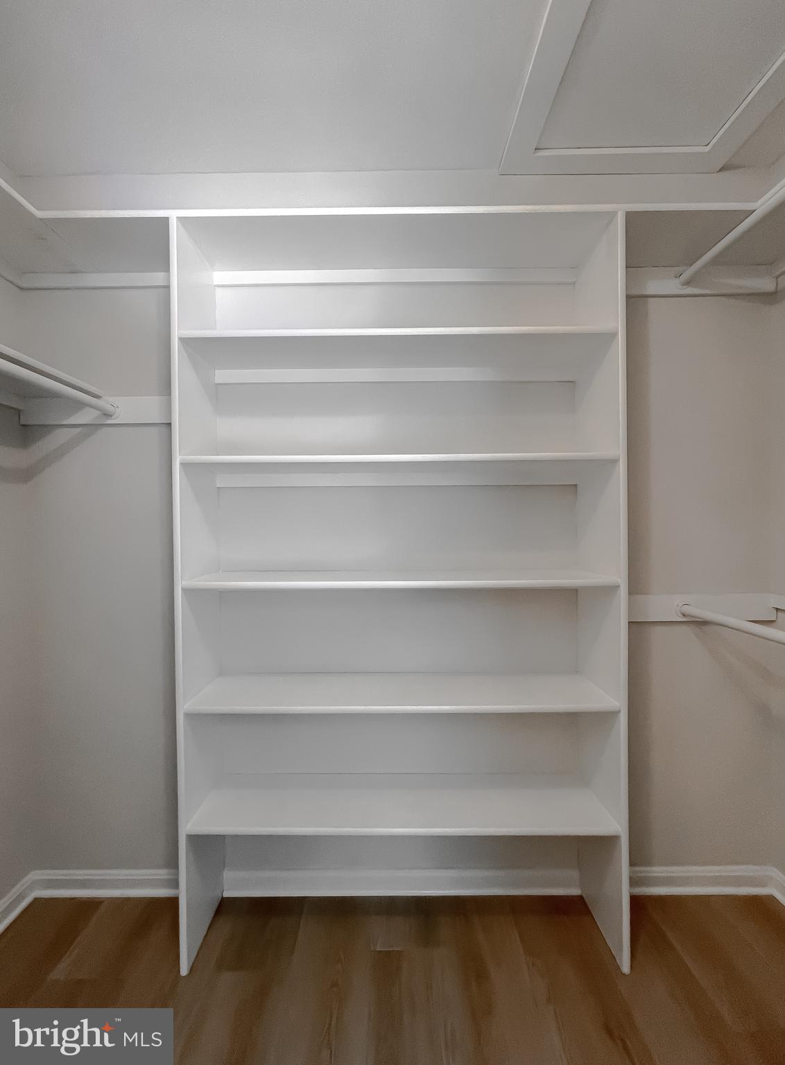 22373 Enoch Road Leonardtown, MD 20650 - Photo 44 of 74 a view of walk in closet with empty racks