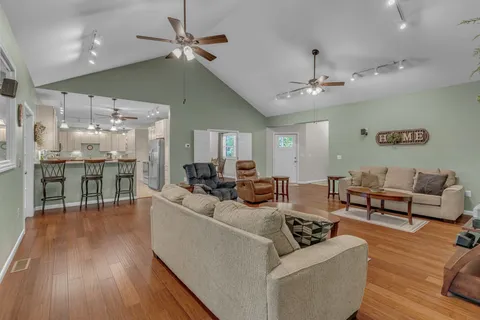 a kitchen with a sink stove and refrigerator