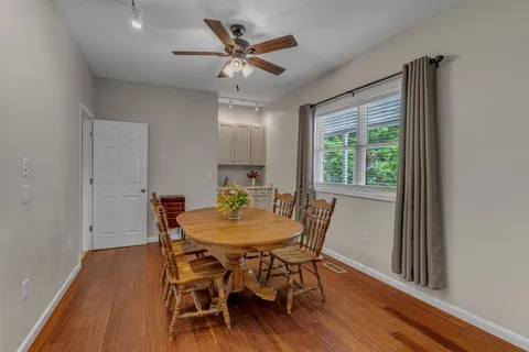 a kitchen with a sink stainless steel appliances and cabinets