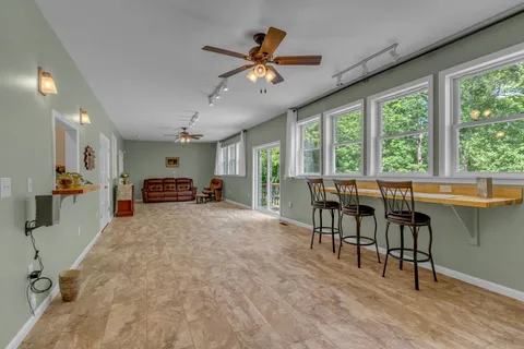 a view of entryway with wooden floor