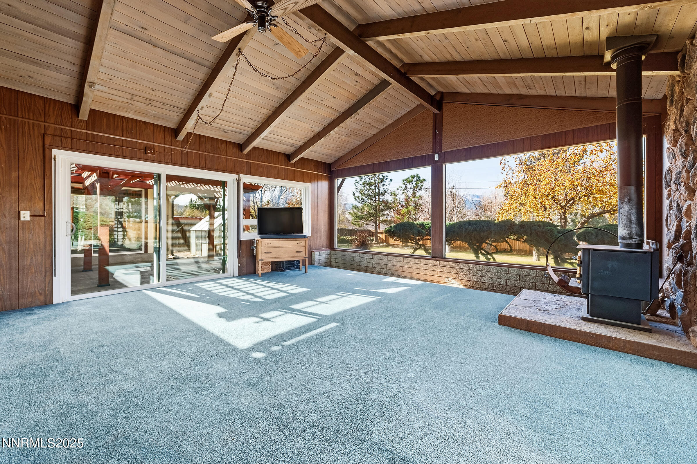 14535 Seminole Trail Reno, NV 89521 - Photo 13 of 25 a view of a room with gym equipment and floor to ceiling window