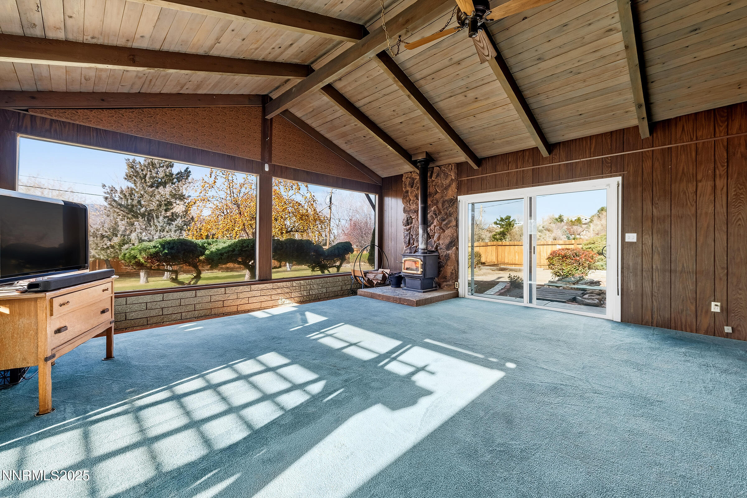 14535 Seminole Trail Reno, NV 89521 - Photo 14 of 25 a view of living room filled with furniture and a flat screen tv