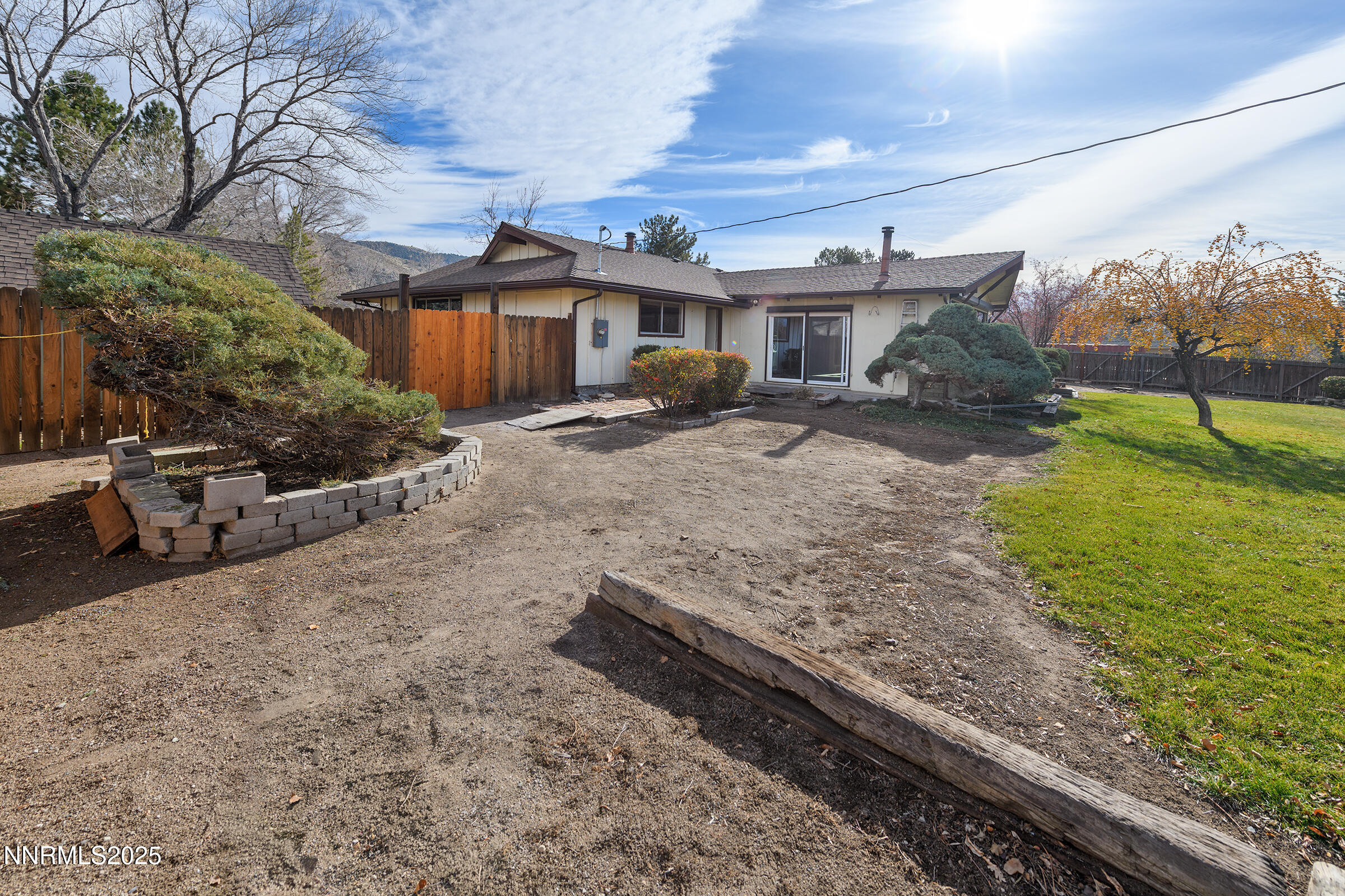 14535 Seminole Trail Reno, NV 89521 - Photo 2 of 25 a front view of a house with garden