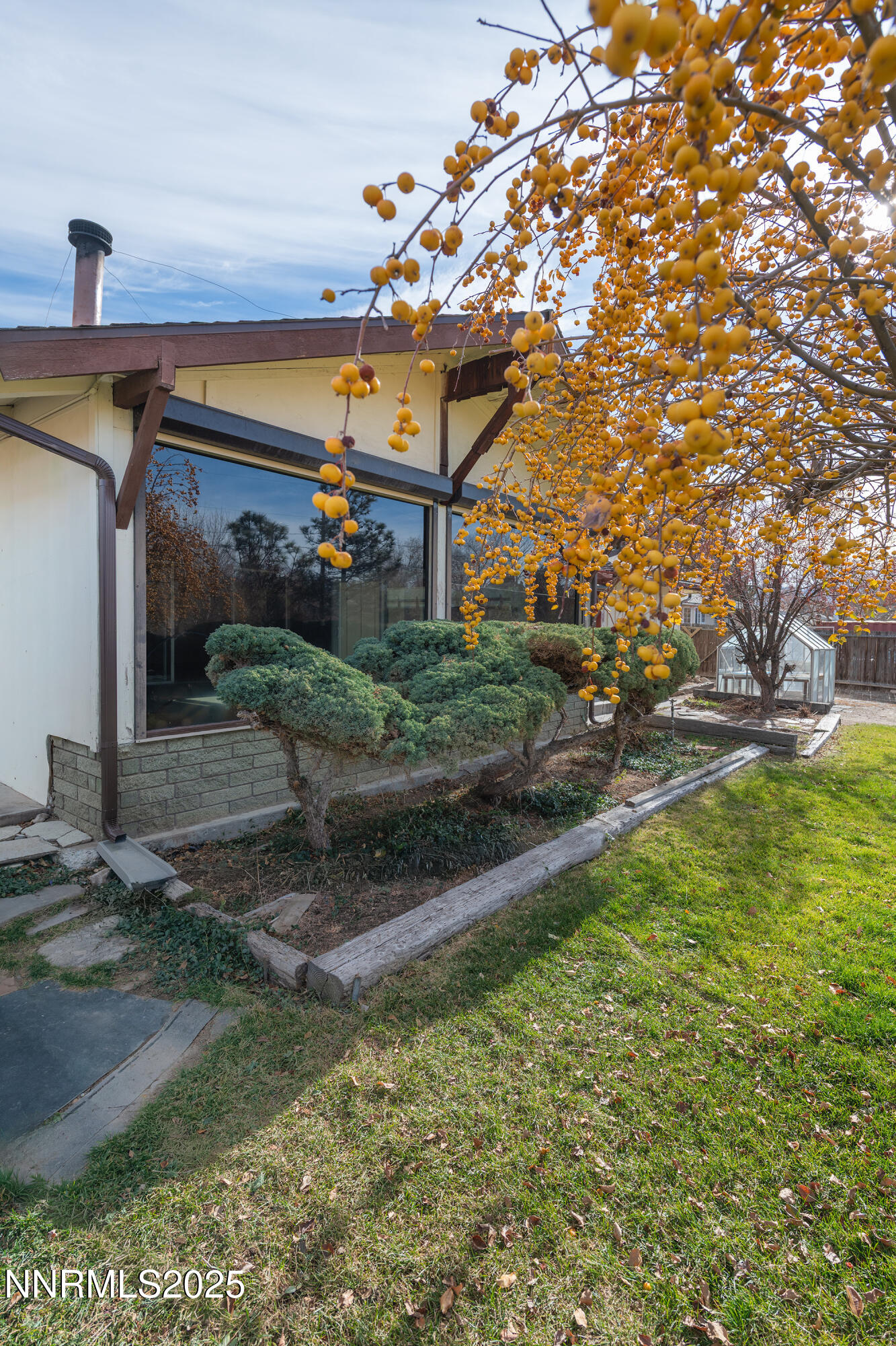 14535 Seminole Trail Reno, NV 89521 - Photo 23 of 25 a front view of a house with a yard