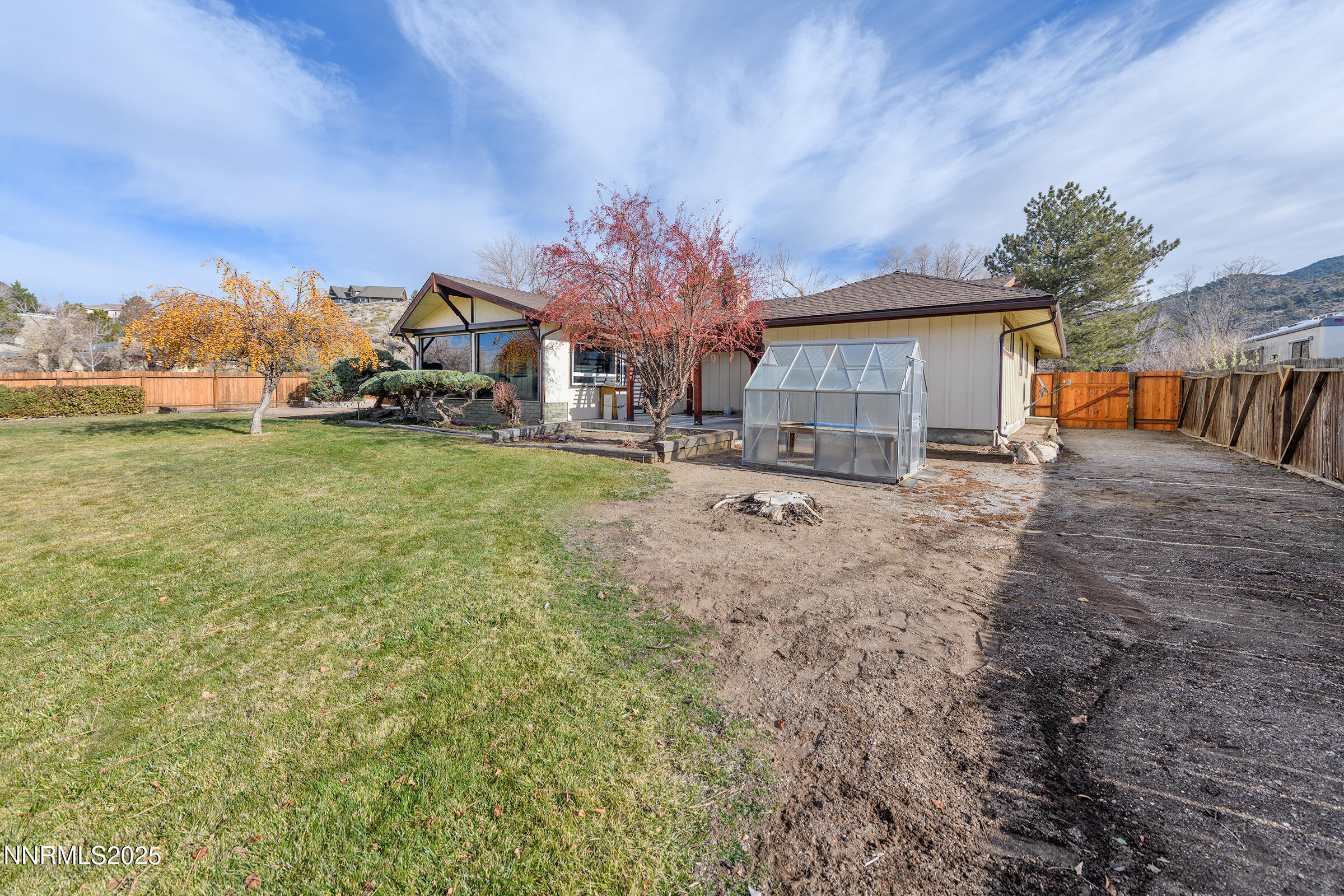 14535 Seminole Trail Reno, NV 89521 - Photo 4 of 25 a front view of a house with a yard