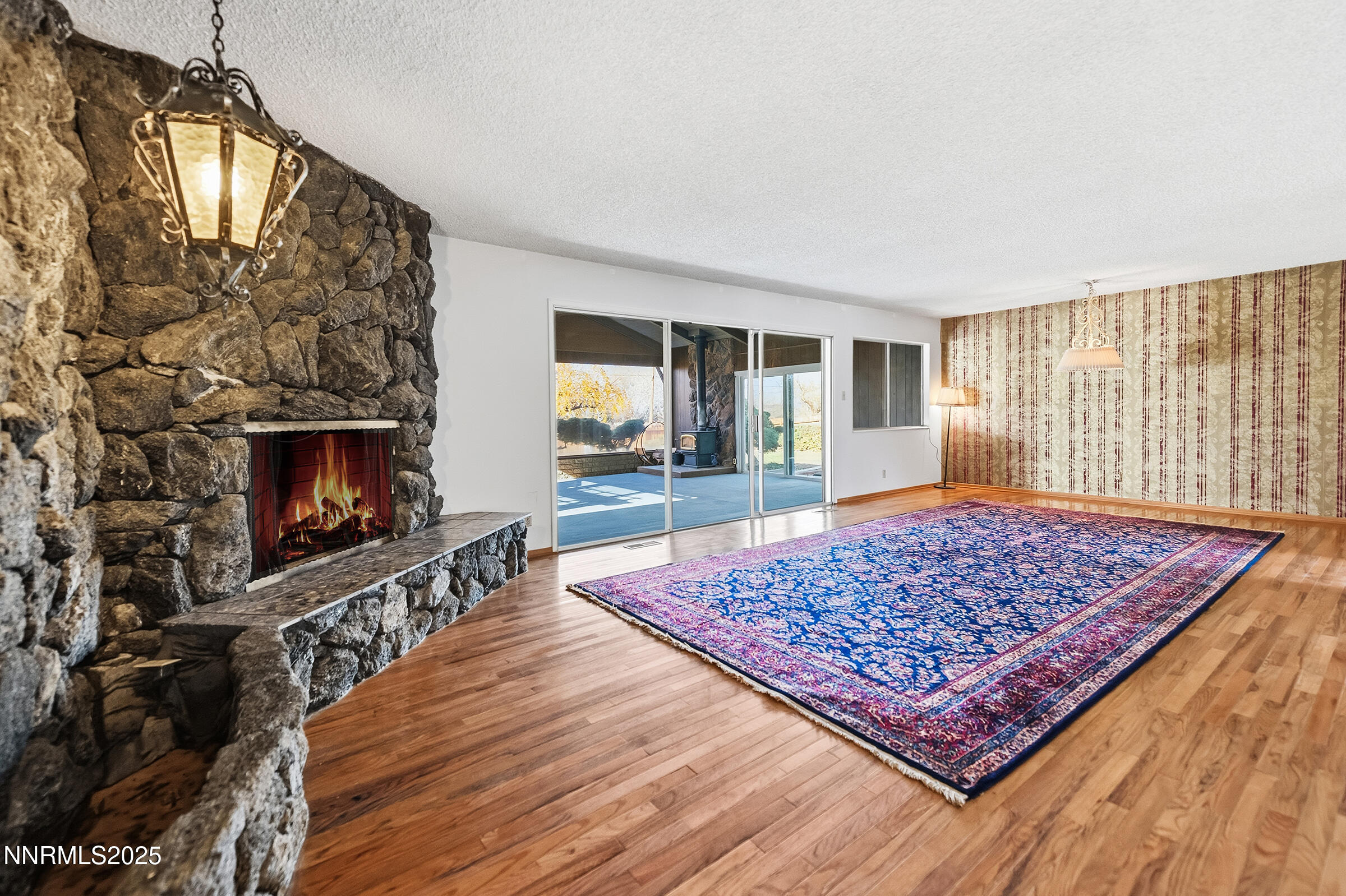 14535 Seminole Trail Reno, NV 89521 - Photo 5 of 25 a living room with furniture and a flat screen tv