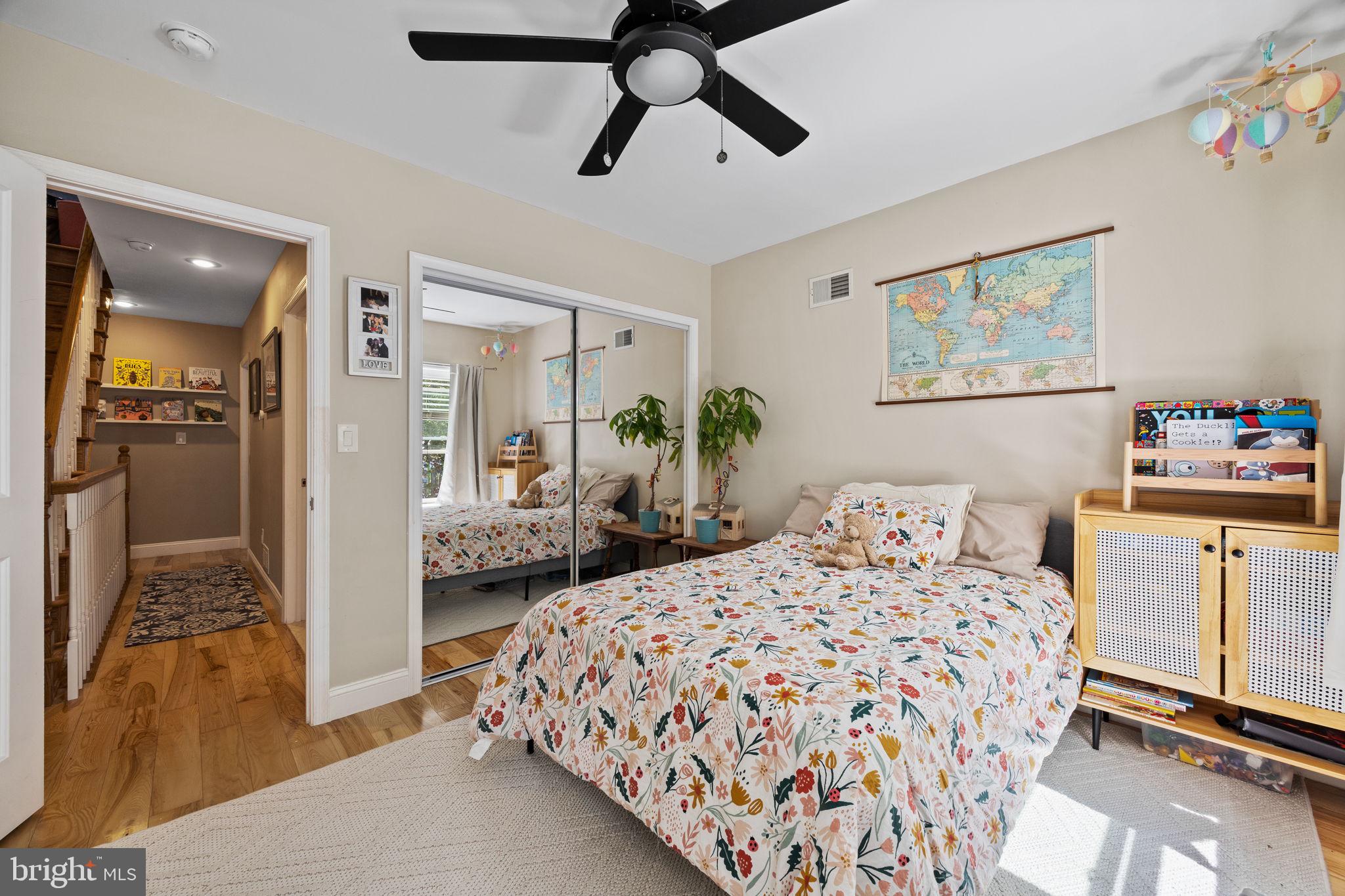 623 Manton Street Philadelphia, PA 19147 - Photo 13 of 26 a bedroom with a bed and painting on the wall