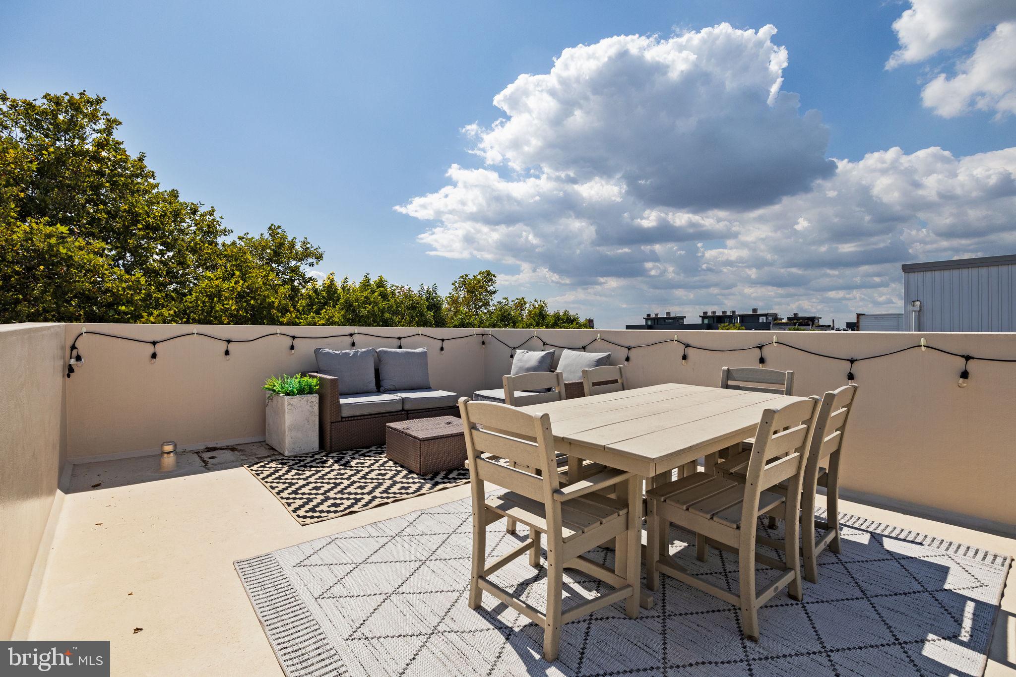 623 Manton Street Philadelphia, PA 19147 - Photo 20 of 26 a terrace with a table and chairs