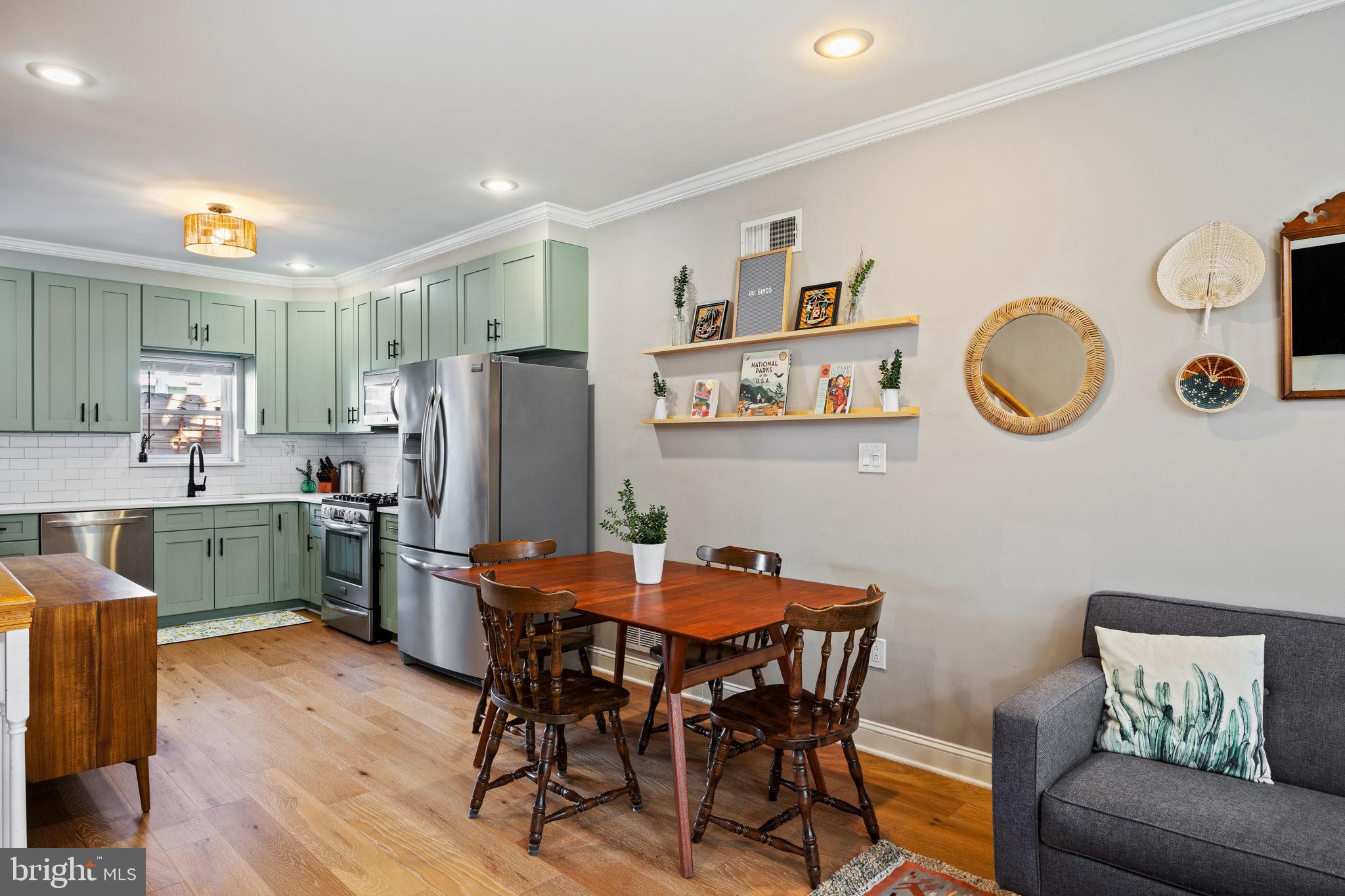 623 Manton Street Philadelphia, PA 19147 - Photo 5 of 26 a view of a dining room with furniture and wooden floor