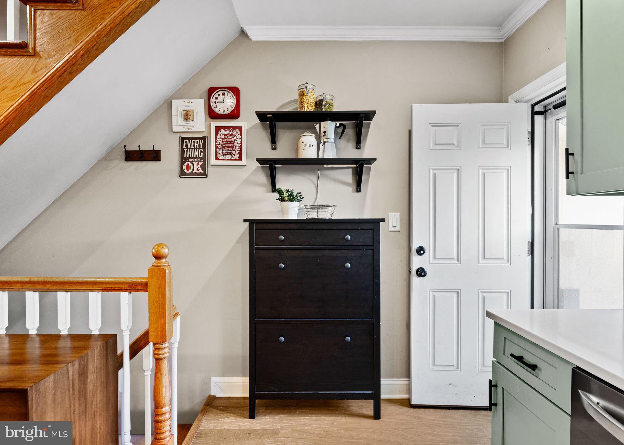 623 Manton Street Philadelphia, PA 19147 - Photo 9 of 26 a room with a cabinets and a dresser