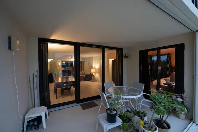 a kitchen with a sink appliances and cabinets