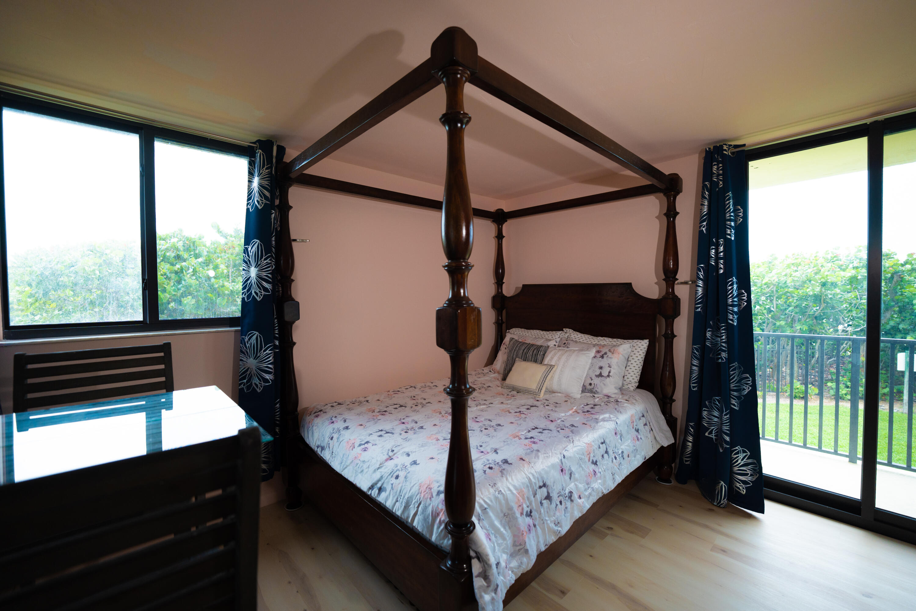 400 Ocean Trail Way, Unit 101 Jupiter, FL 33477 - Photo 48 of 60 a bedroom with a bed and a window