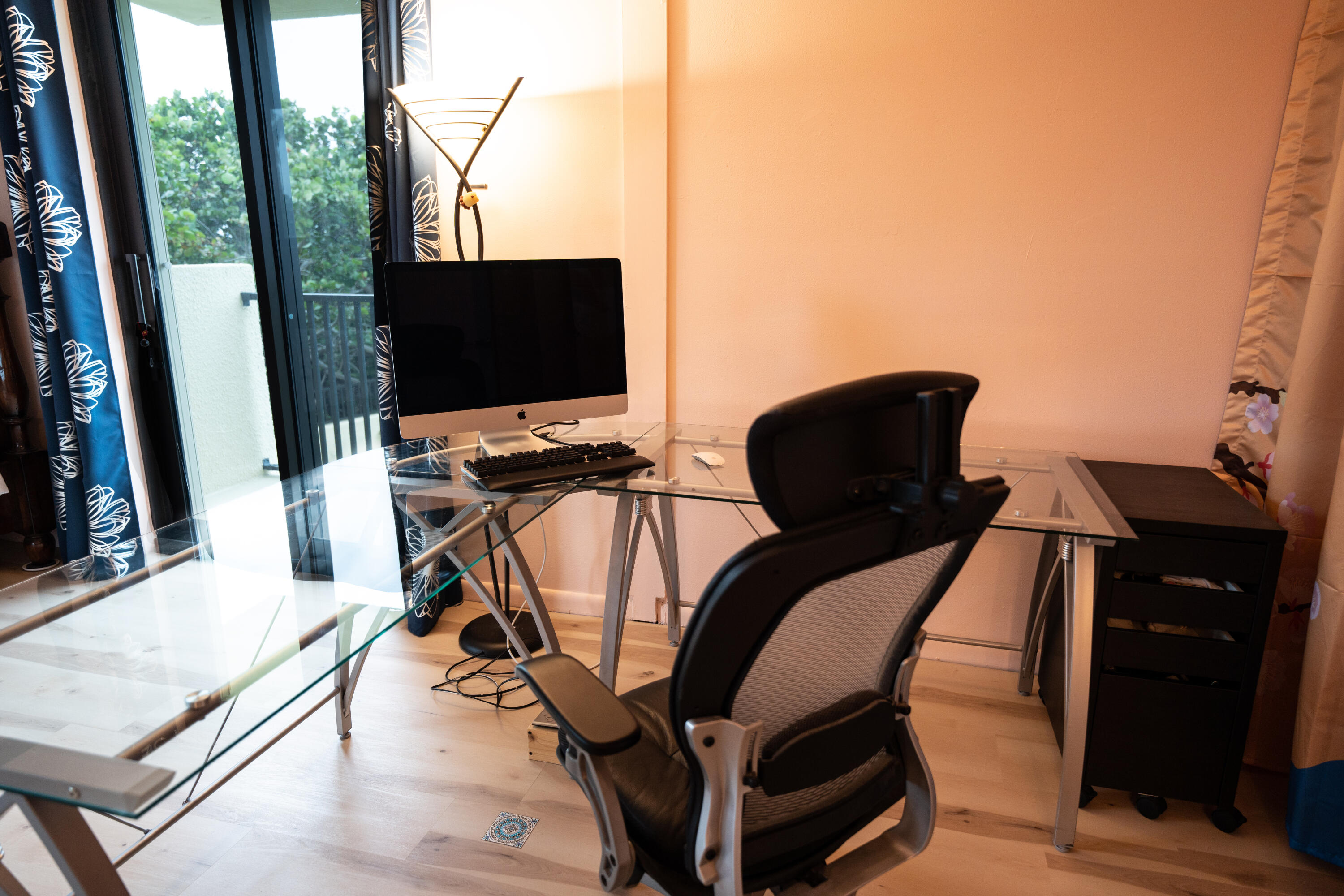 400 Ocean Trail Way, Unit 101 Jupiter, FL 33477 - Photo 49 of 60 a view of a workspace with furniture and a flat screen tv