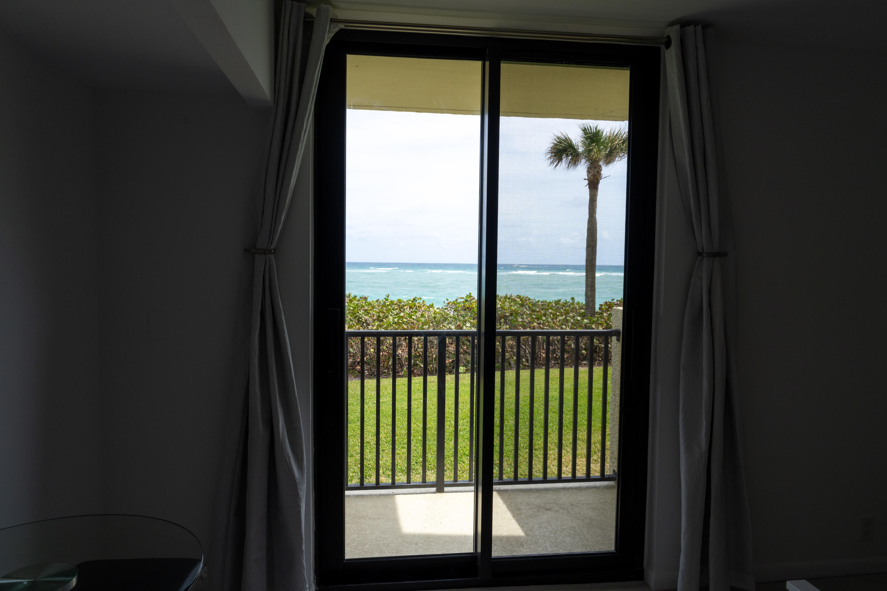 400 Ocean Trail Way, Unit 101 Jupiter, FL 33477 - Photo 60 of 60 a view of a large window with an outdoor view