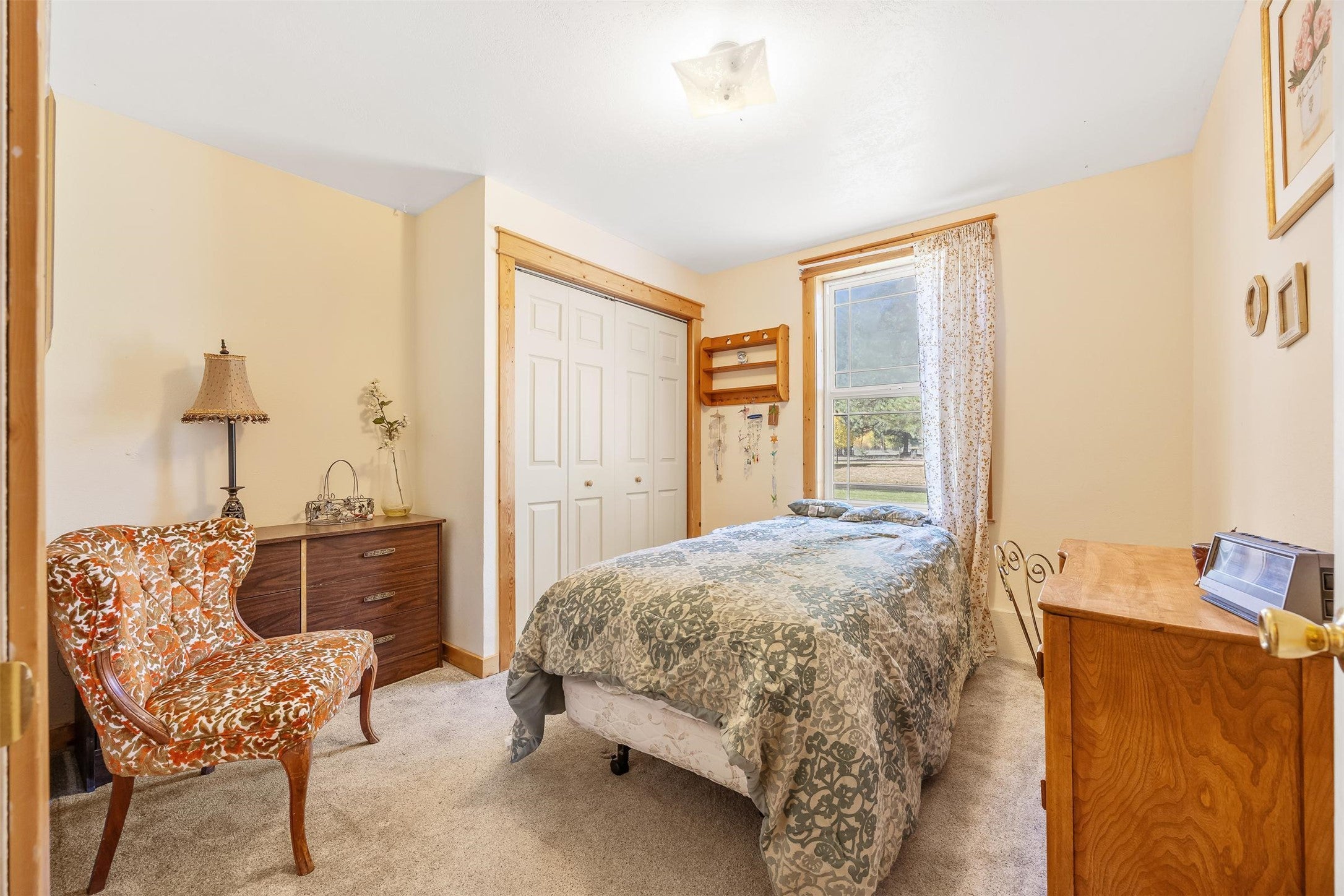 212 St Marys Road Stevensville, MT 59870 - Photo 15 of 39 Bedroom featuring carpet flooring and a closet