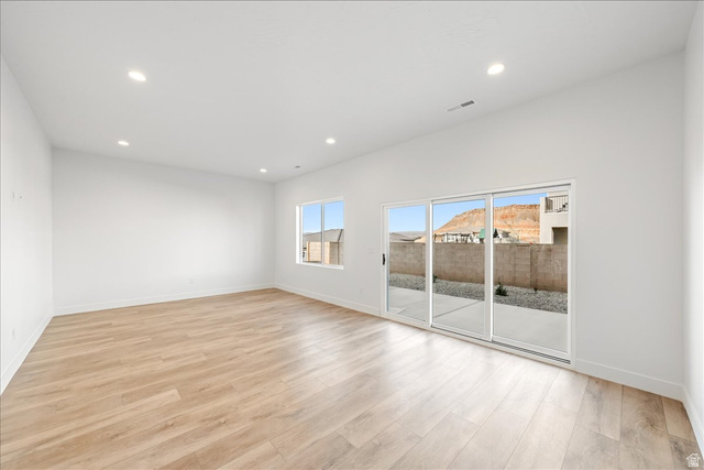 1491 East Centaurus Way, Unit 86 Washington, UT 84780 - Photo 11 of 26 Spare room featuring light wood-style floors and recessed lighting