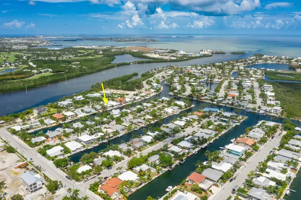 a view of a city with an ocean