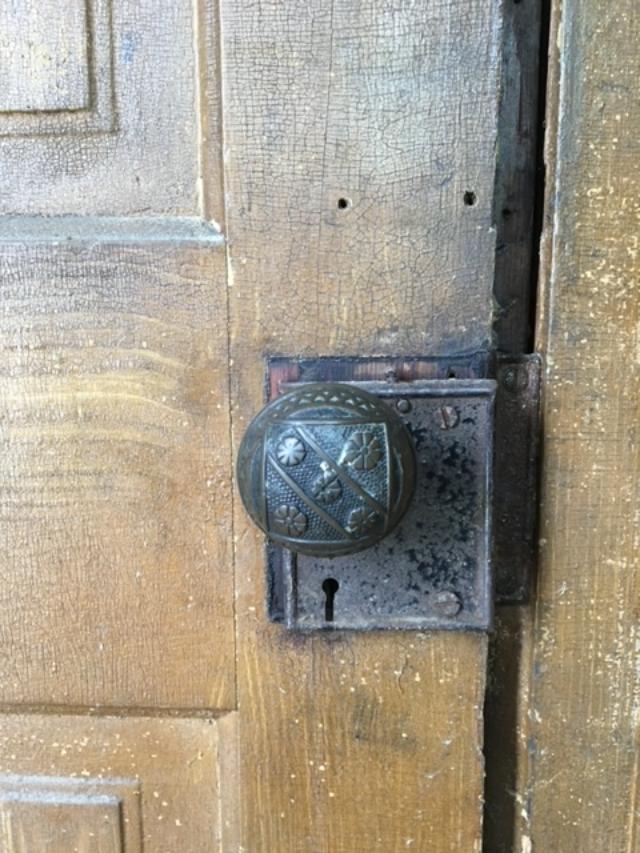 116 North Main Street Gilman, IL 60938 - Photo 9 of 18 a bathroom with a granite countertop sink and a mirror