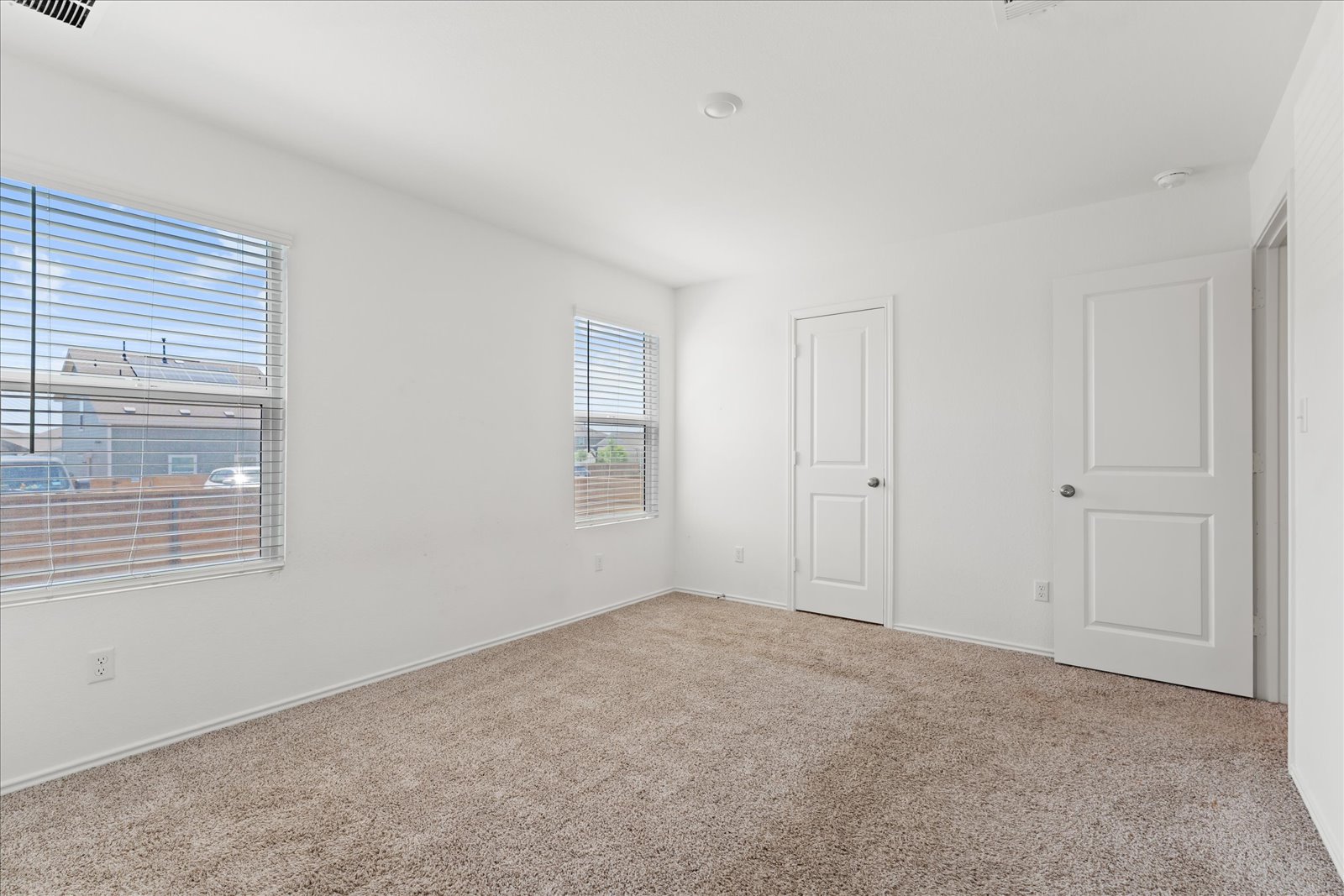 905 Powell Kyle, TX 78640 - Photo 18 of 37 a view of an empty room with a window