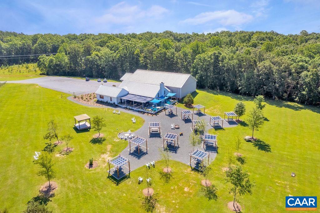 3304 A Ruritan Lake Road Palmyra, VA 22963 - Photo 1 of 37 a view of a swimming pool with a mountain