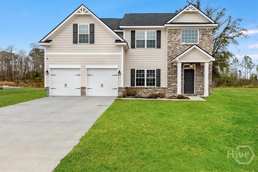 392 Akins Ranch Road Northeast Ludowici, GA 31316 - Photo 1 of 48 Grass is digitally enhanced.