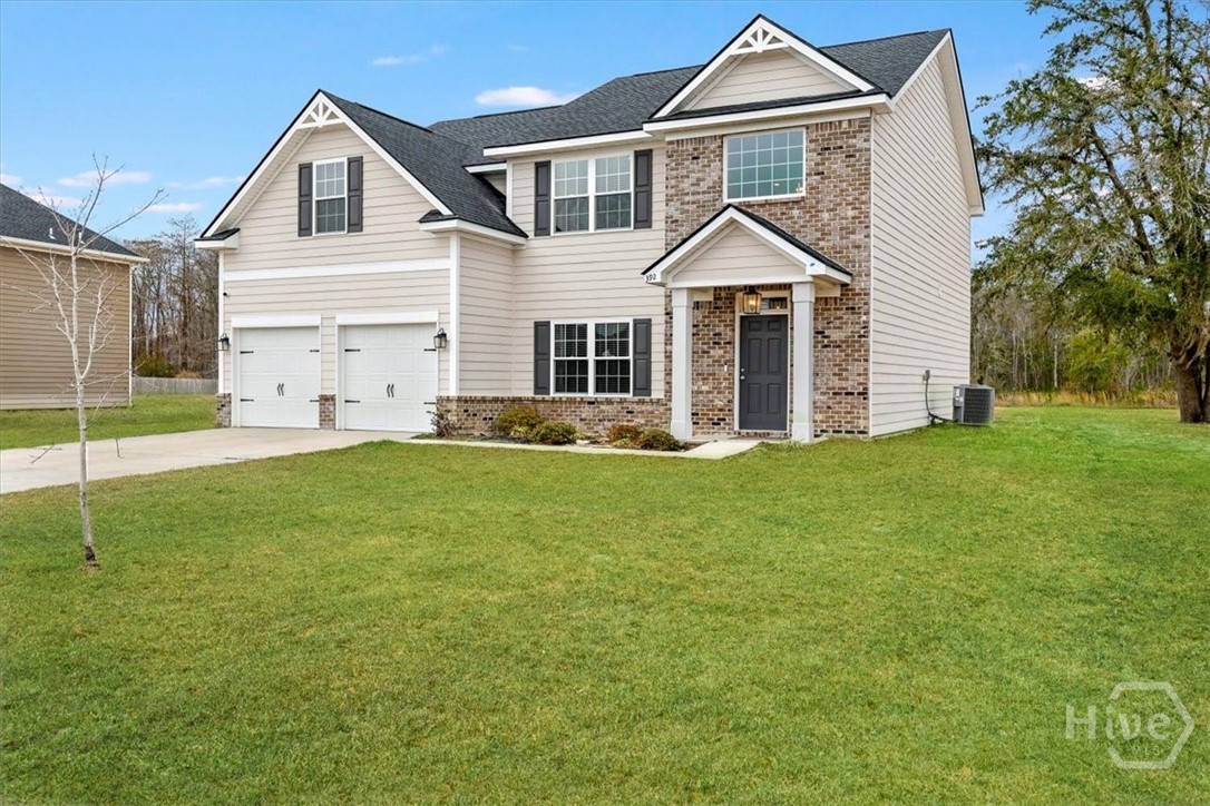 392 Akins Ranch Road Northeast Ludowici, GA 31316 - Photo 2 of 48 Grass is digitally enhanced.