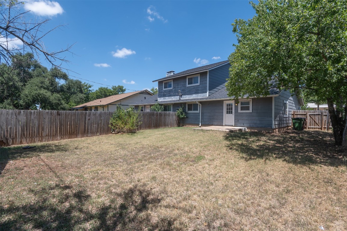 403 West Bowman Road, Unit A Round Rock, TX 78664 - Photo 15 of 17 a view of a house with a yard