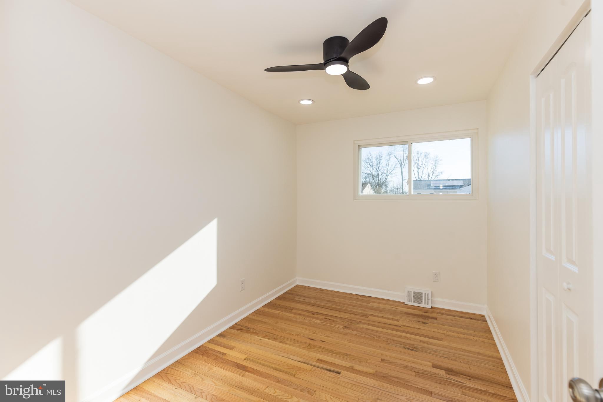 5510 Daybreak Terrace Baltimore, MD 21206 - Photo 17 of 43 a view of empty room with wooden floor