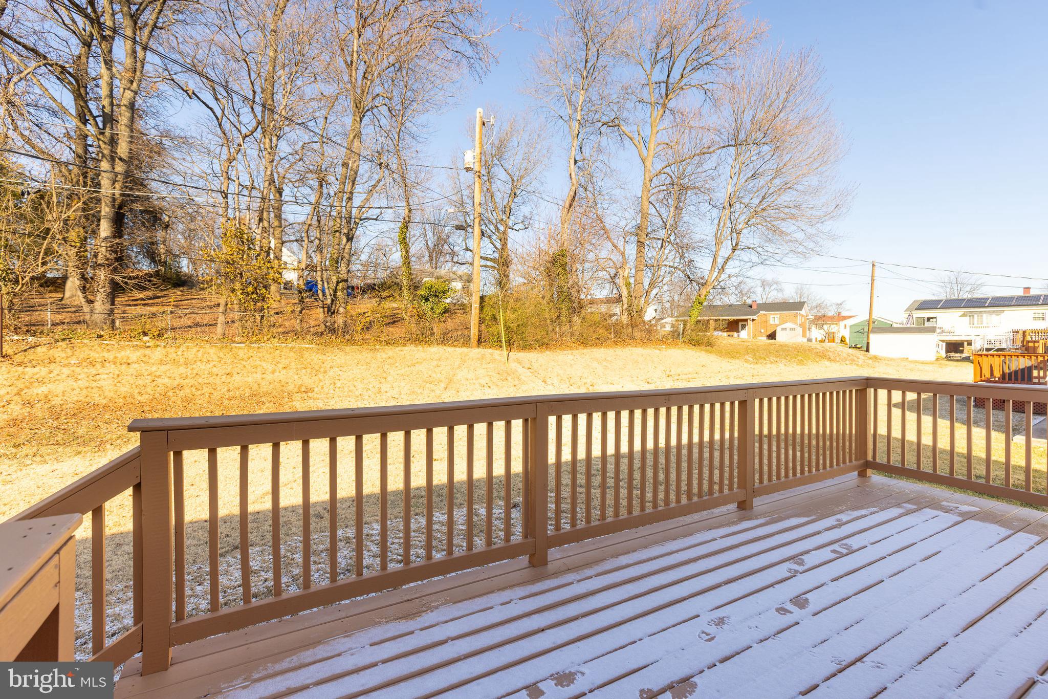5510 Daybreak Terrace Baltimore, MD 21206 - Photo 41 of 43 a view of wooden balcony with a yard