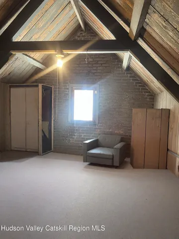 a view of a livingroom with furniture