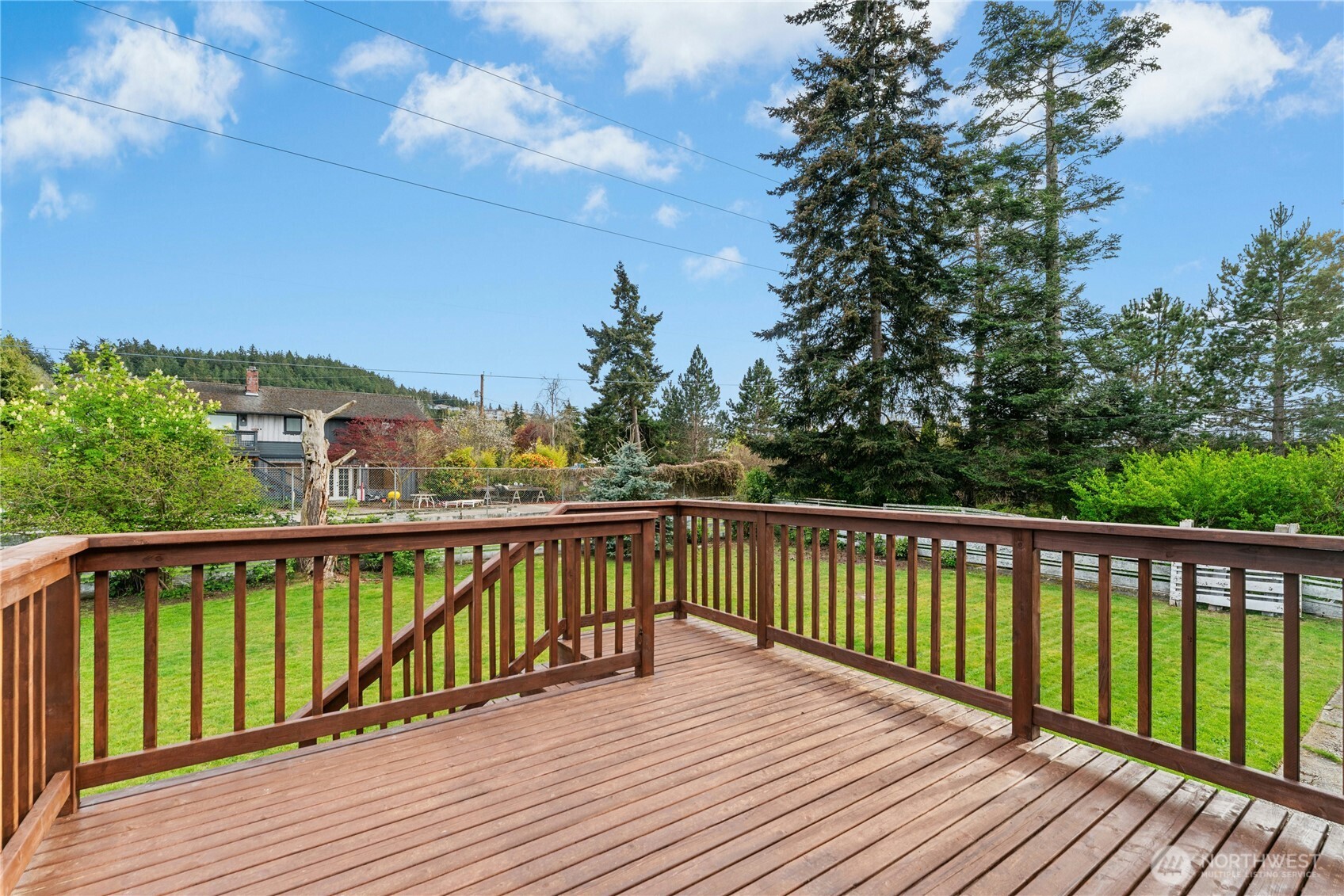 3501 West 3rd Street Anacortes, WA 98221 - Photo 24 of 28 a view of balcony with wooden floor and fence