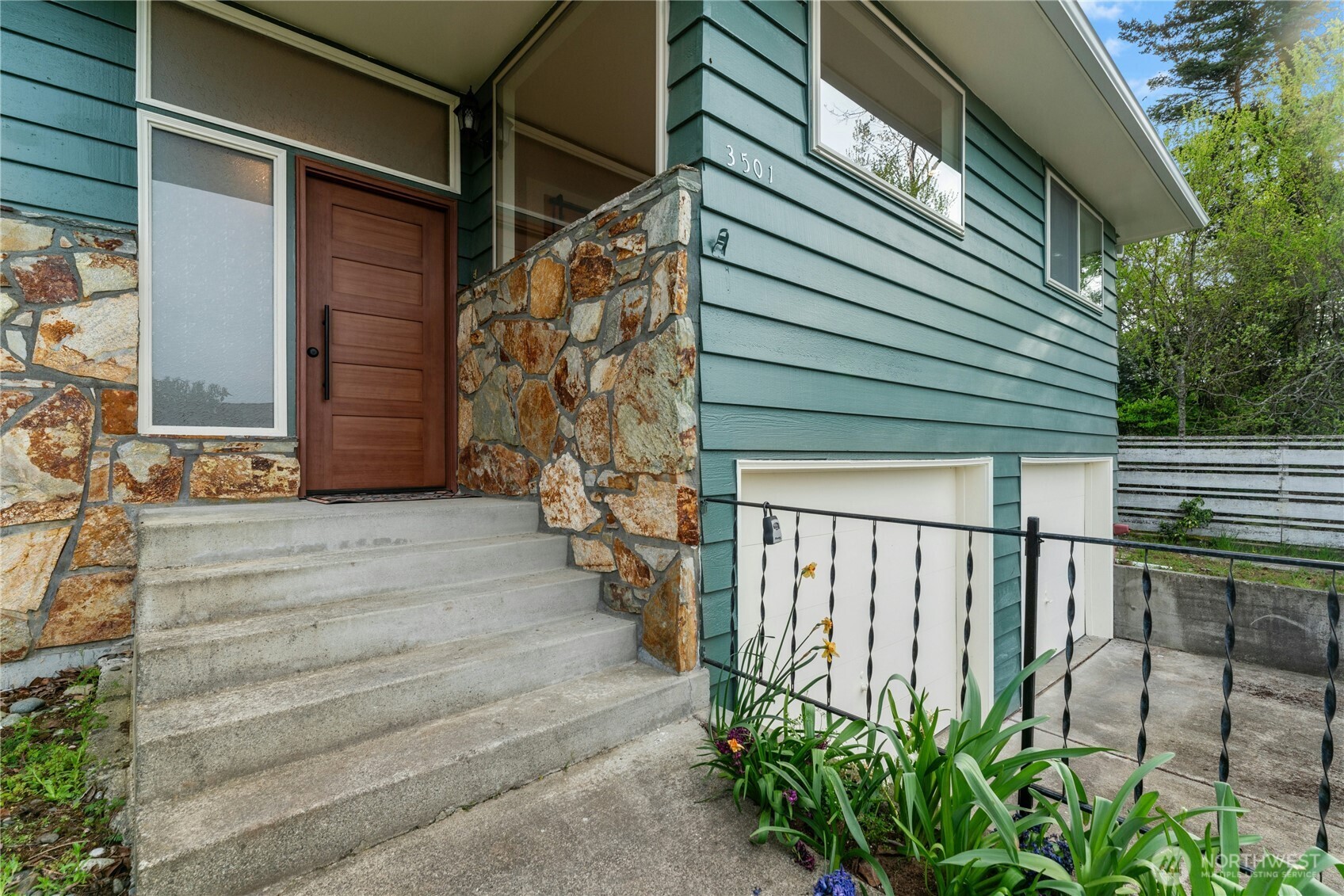 3501 West 3rd Street Anacortes, WA 98221 - Photo 4 of 28 a view of a house with a yard