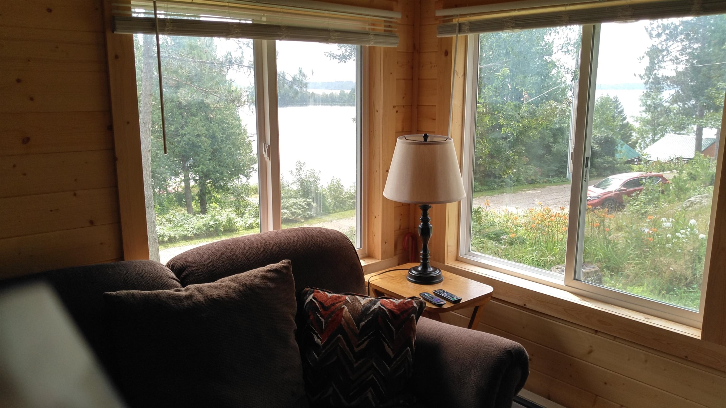 13496 Pine Road, Unit 10 Ely, MN 55731 - Photo 12 of 26 Sunroom featuring plenty of natural light and a water view