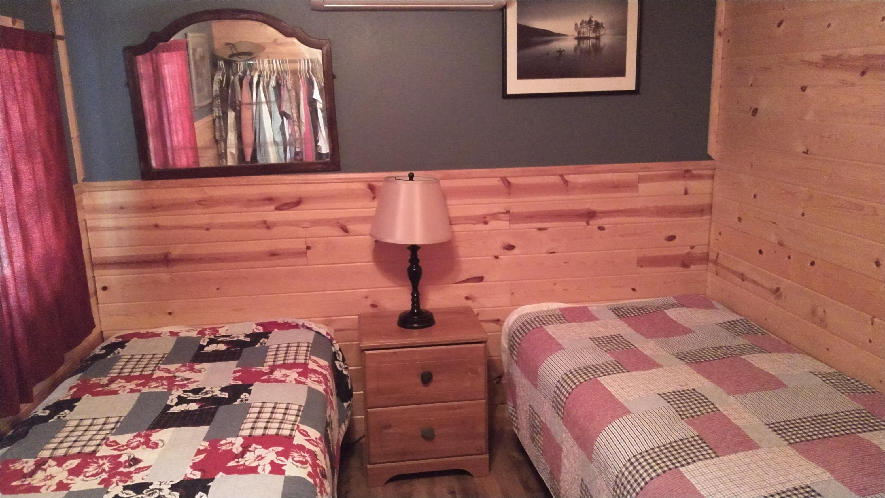 13496 Pine Road, Unit 10 Ely, MN 55731 - Photo 10 of 26 Bedroom with wood walls