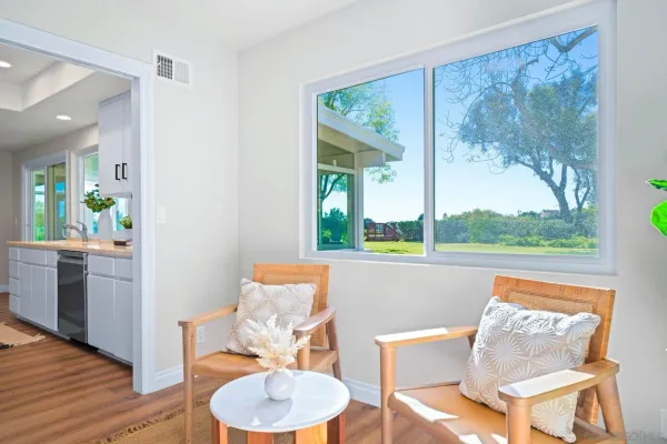 a living room with furniture and a window