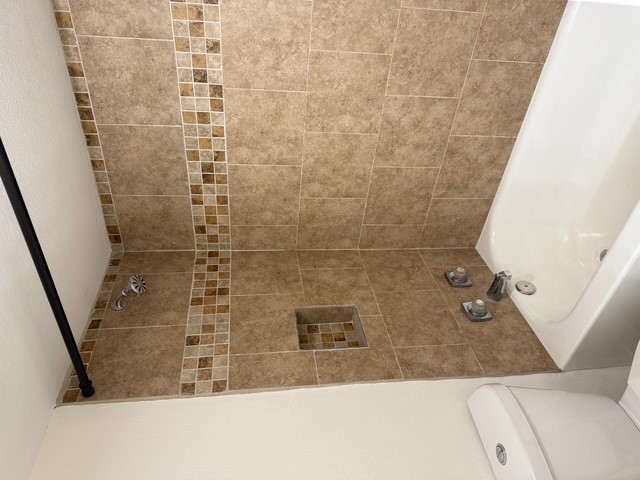 4409 Guadalupe Street, Unit 3 Austin, TX 78751 - Photo 17 of 18 a bathroom with a shower and a toilet