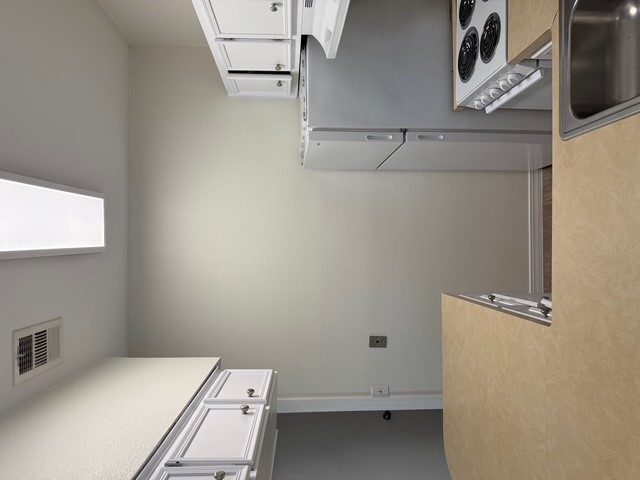 4409 Guadalupe Street, Unit 3 Austin, TX 78751 - Photo 8 of 18 a room with storage and utility